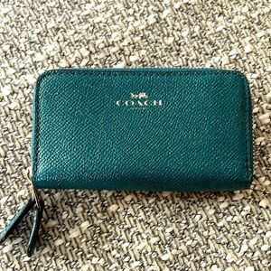 Coach double zip dark teal color with a bit of sparkle. Some water damage photo